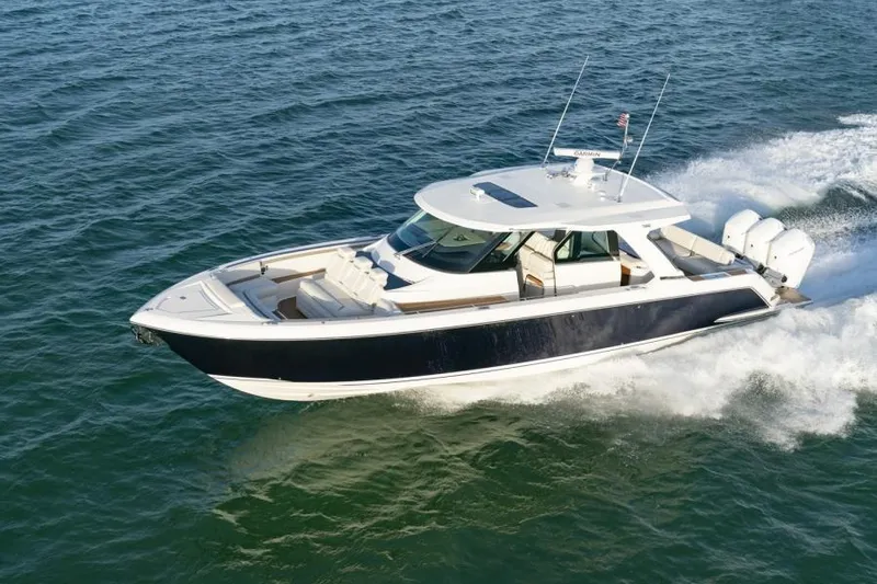 Slide: The Image of 2023 Tiara Yachts 48 LS cruising on open water. - 4