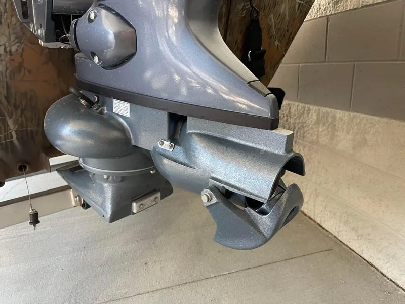 Slide: The Image of Close-up of the 2024 G3 Gator Tough 17 CCJ boat motor. - 4