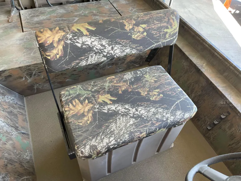 Slide: The Image of 2024 G3 Gator Tough 17 CCJ boat seat with camouflage upholstery. - 6