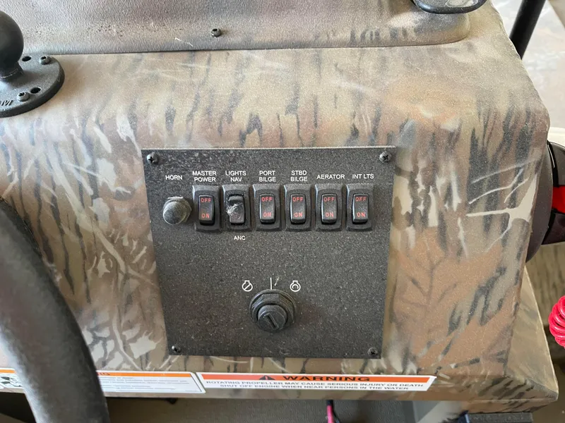 Slide: The Image of Control panel of 2024 G3 Gator Tough 17 CCJ boat with camouflage design. - 7