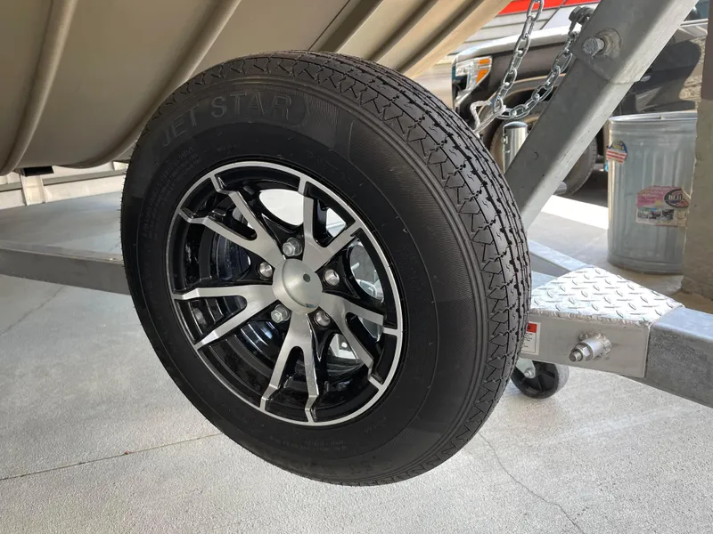 Slide: The Image of Close-up of a 2024 G3 Gator Tough 17 CCJ trailer wheel and tire. - 8