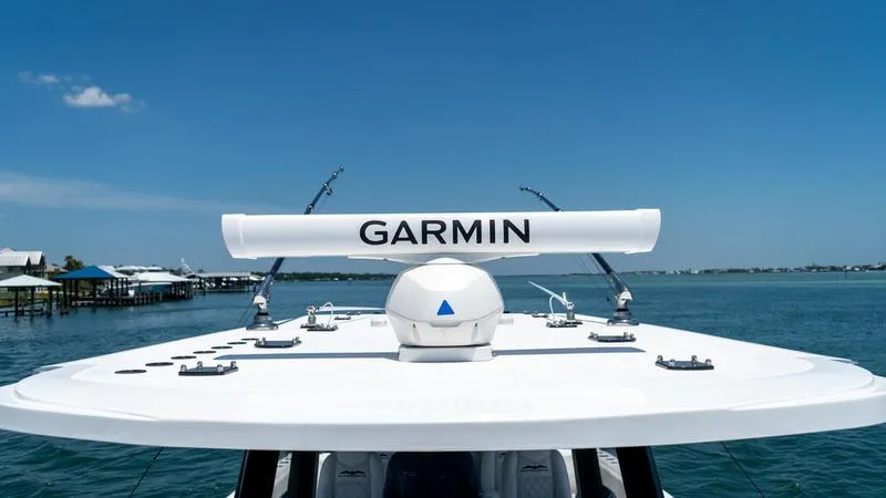 Slide: The Image of 2024 Invincible 40' Catamaran with Garmin radar on open water. - 11