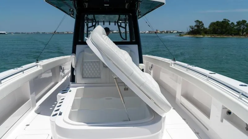 Slide: The Image of 2024 Invincible 40' Catamaran with open storage compartment on deck. - 12