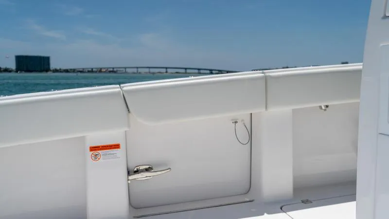 Slide: The Image of 2024 Invincible 40' Catamaran deck with ocean and bridge view. - 33