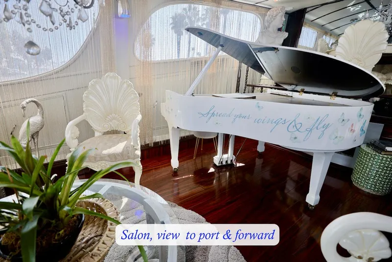 Slide: The Image of Luxurious salon with grand piano on a 1945 yacht. - 13