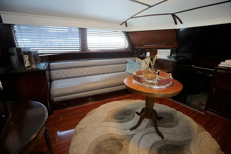 Slide: The Image of Interior of a 1945 Custom Motor Yacht with sofa and table. - 19