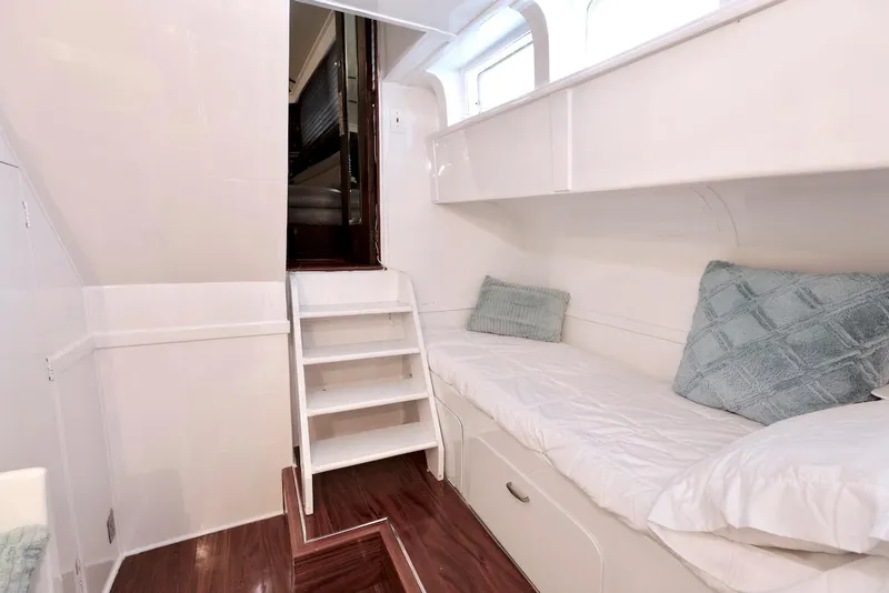 Slide: The Image of Interior of a 1945 Custom Motor Yacht with bed and stairs. - 34