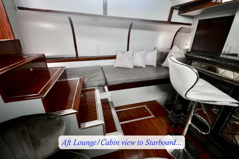Slide: The Image of Interior of a 1945 custom motor yacht with lounge and bar stool. - 39
