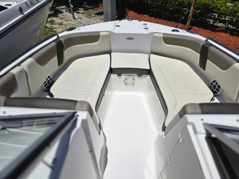 Slide: The Image of 2021 Chaparral 230 boat with spacious bow seating area. - 4