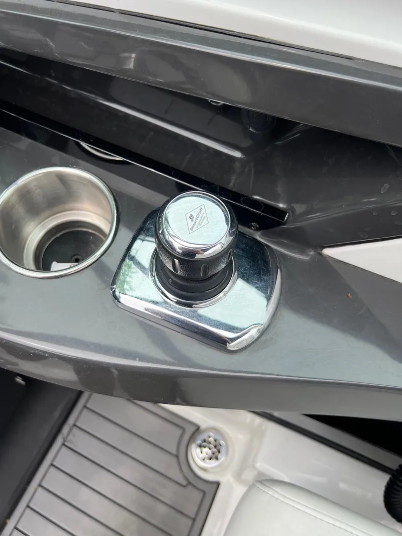 Slide: The Image of 2016 Monterey 328SS boat control panel with cup holder. - 20