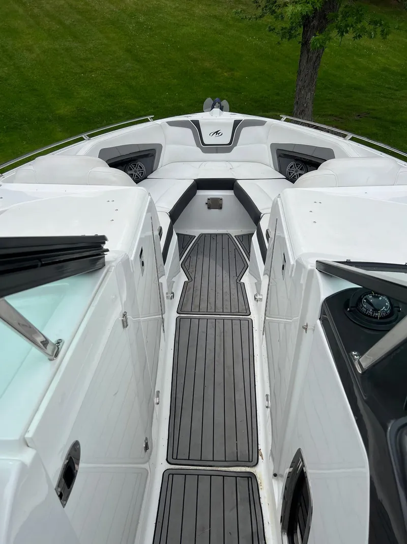 Slide: The Image of 2016 Monterey 328SS boat interior with sleek design and spacious seating. - 9