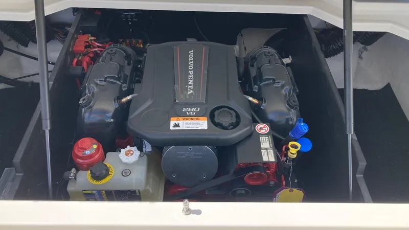 Slide: The Image of 2024 Regal LS2 boat engine compartment with Volvo Penta V8 engine. - 8