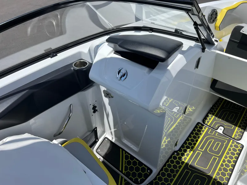 Slide: The Image of 2023 Scarab 255 Wake ID boat interior with modern dashboard and stylish flooring. - 32
