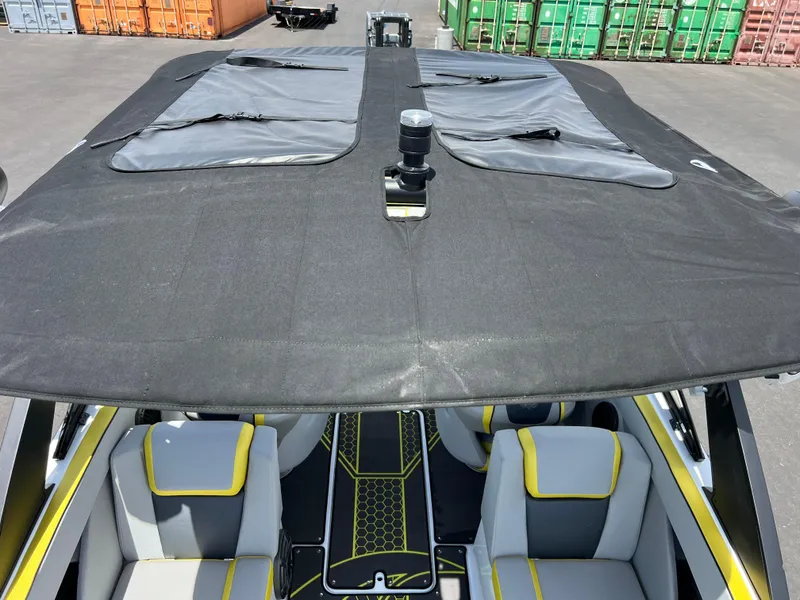 Slide: The Image of 2023 Scarab 255 Wake ID boat with covered seating and vibrant interior design. - 41