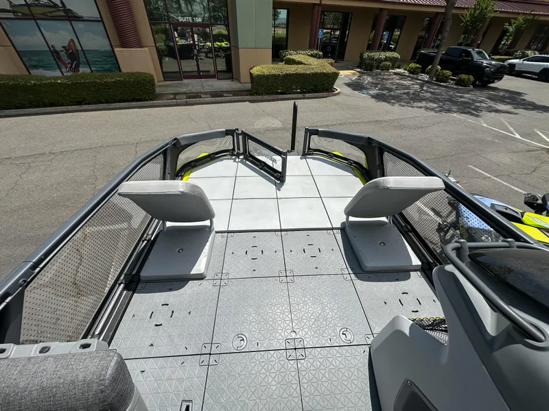 Slide: The Image of 2024 Sea-Doo Switch Sport 21 deck view, featuring spacious seating and modern design. - 16