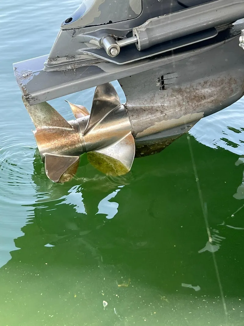Slide: The Image of Close-up of a 2006 Regal 2600 Bowrider boat propeller in water. - 30