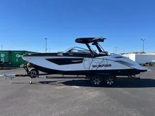 Slide: The Image of 2024 Scarab 285 Wake ID boat on trailer in parking lot. - 5