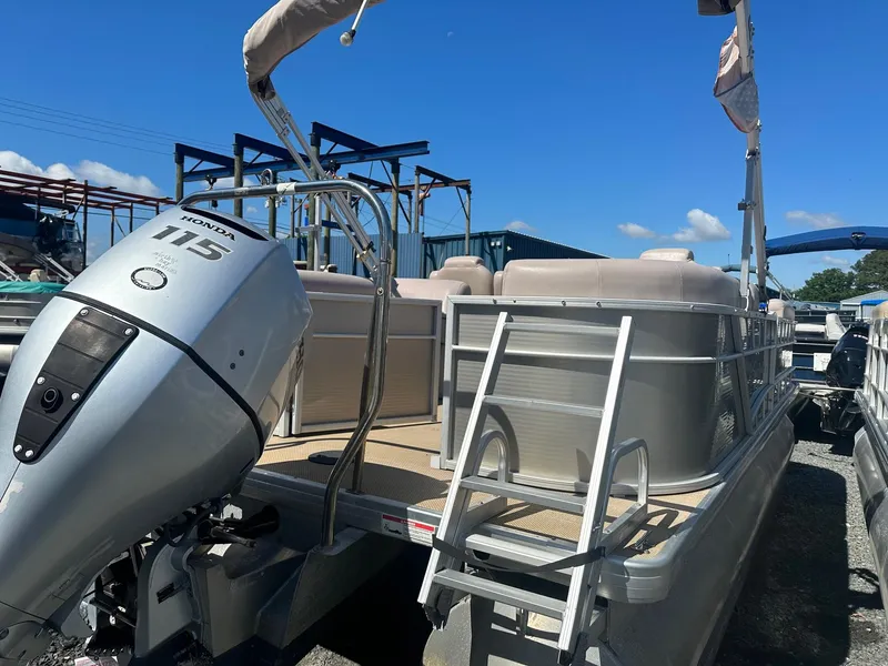 Slide: The Image of 2015 Godfrey 2286 Sweetwater Pontoon with Honda 115 outboard motor. - 2