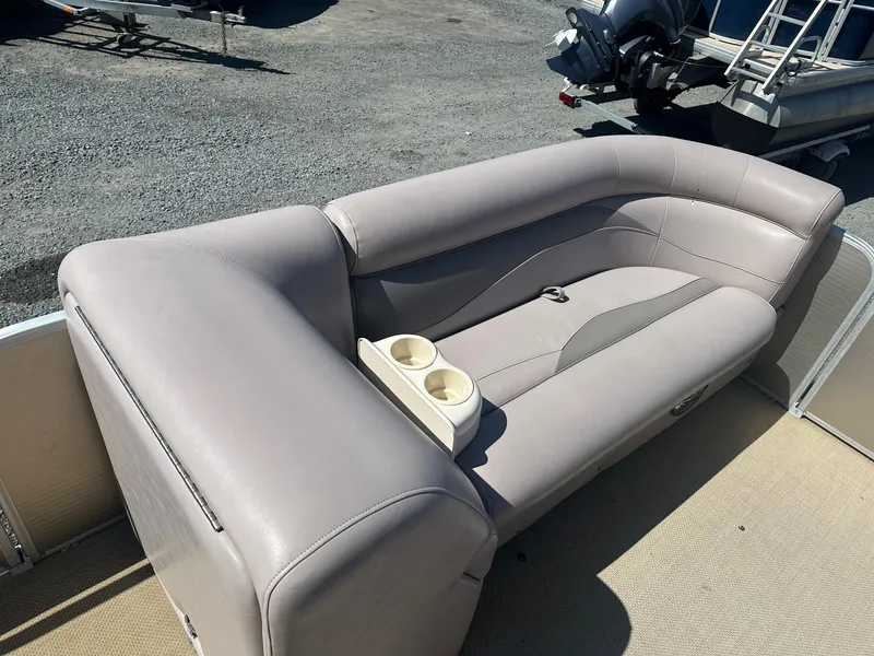 Slide: The Image of 2015 Godfrey 2286 Sweetwater Pontoon boat seating with cup holders. - 9