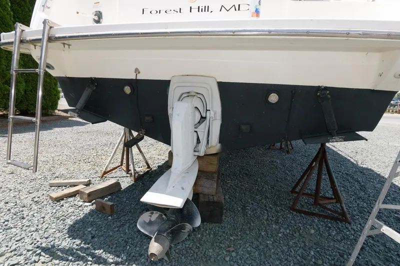 Slide: The Image of 1995 Wellcraft 2800 Martinique boat on stands, rear view, out of water, Forest Hill, MD. - 12