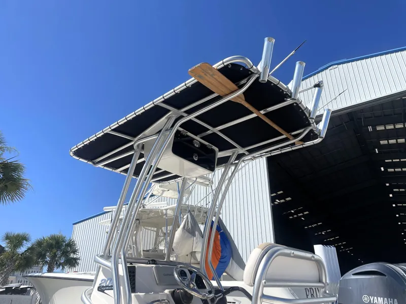 Slide: The Image of 2018 Robalo 206 Cayman boat with T-top and Yamaha engine. - 15