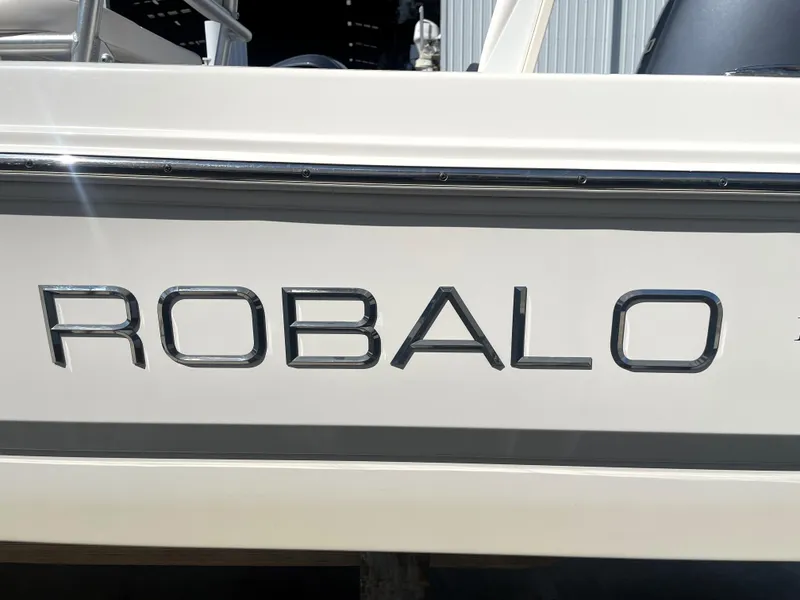 Slide: The Image of 2018 Robalo 206 Cayman boat side view with logo. - 17