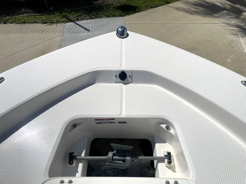 Slide: The Image of 2018 Robalo 206 Cayman boat bow with anchor storage compartment. - 20
