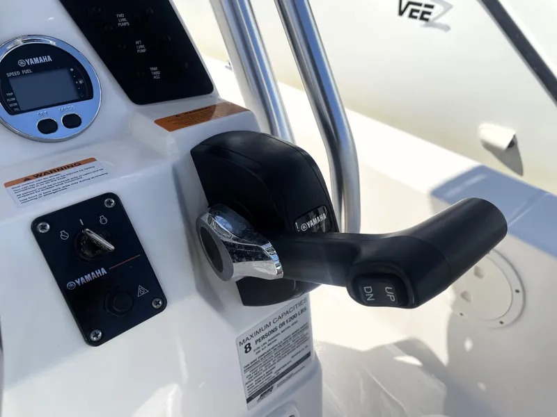 Slide: The Image of 2018 Robalo 206 Cayman boat control panel with Yamaha throttle and gauges. - 32