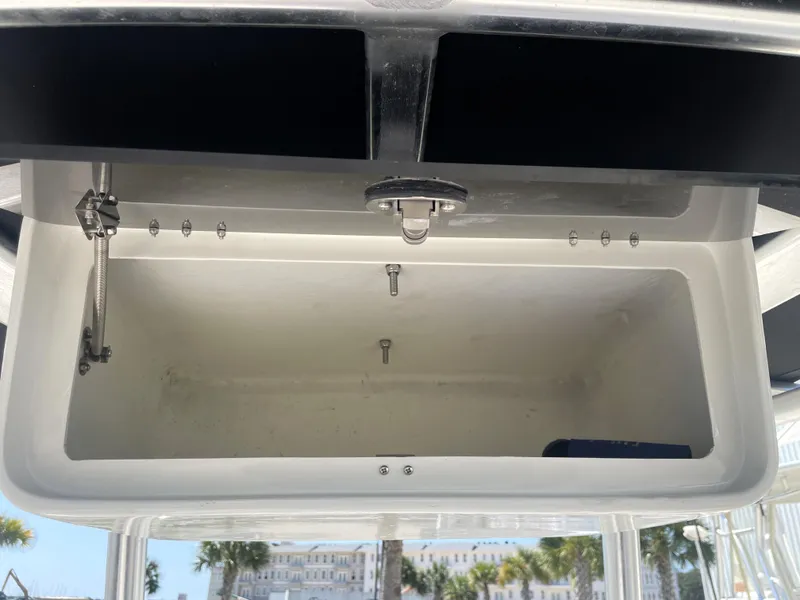 Slide: The Image of Open storage compartment on a 2018 Robalo 206 Cayman boat. - 37