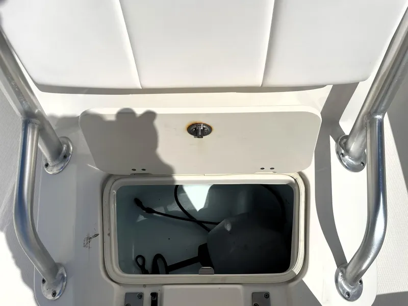 Slide: The Image of Storage compartment on a 2018 Robalo 206 Cayman boat. - 44