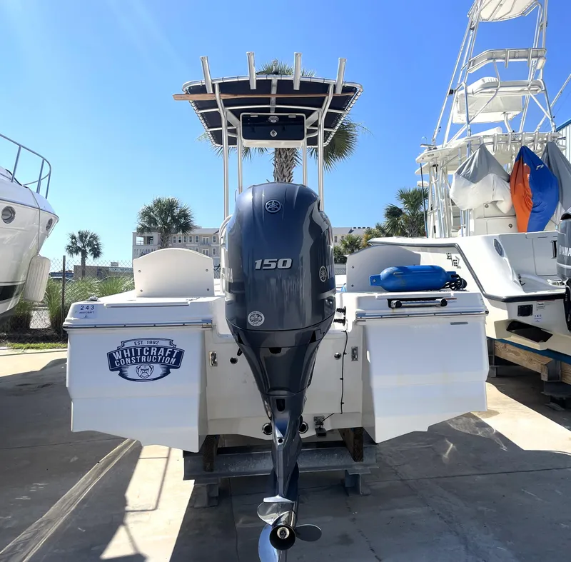 Slide: The Image of 2018 Robalo 206 Cayman boat with Yamaha 150 outboard motor in marina. - 9
