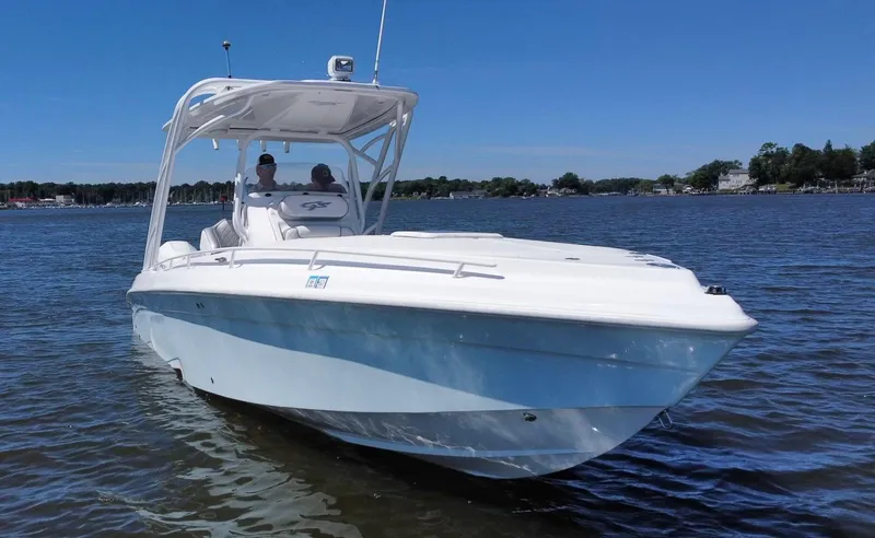 Slide: The Image of 2020 Glasstream 280 SCX boat on calm water. - 14