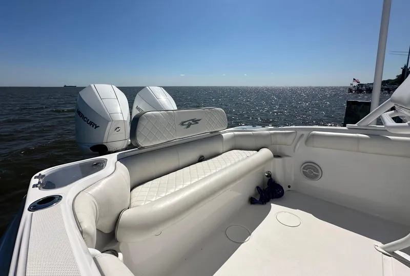 Slide: The Image of 2020 Glasstream 280 SCX boat with twin Mercury outboard engines on open water. - 16