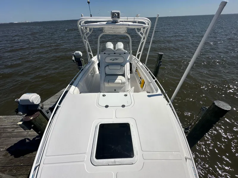 Slide: The Image of 2020 Glasstream 280 SCX boat docked on a sunny day. - 25