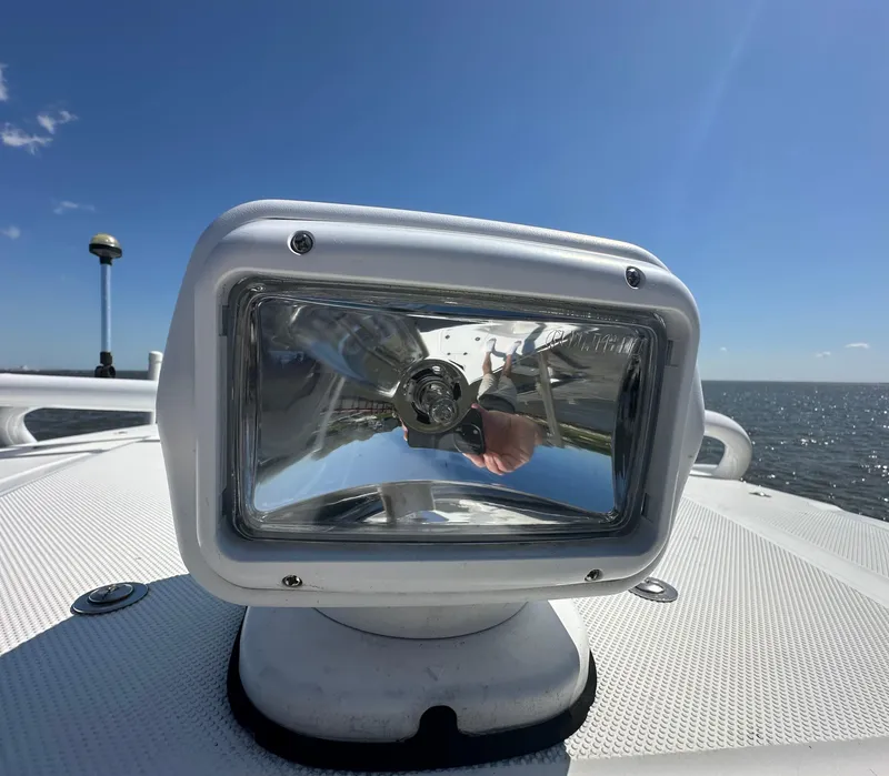 Slide: The Image of Close-up of spotlight on 2020 Glasstream 280 SCX boat with ocean background. - 27