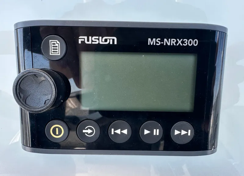 Slide: The Image of Fusion MS-NRX300 marine stereo controller on a 2020 Glasstream 280 SCX boat. - 34