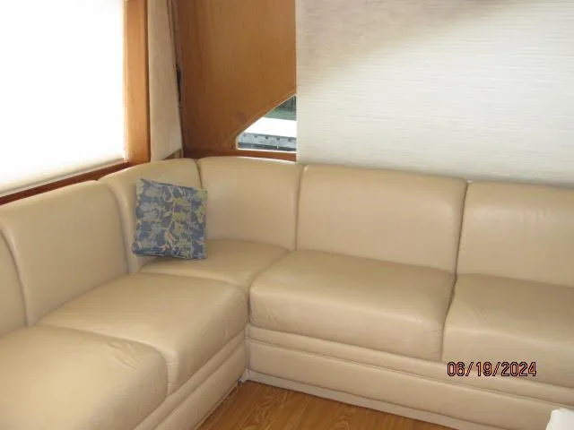 Slide: The Image of Beige leather sofa in 2004 Ocean Yachts Super Sport interior. - 13