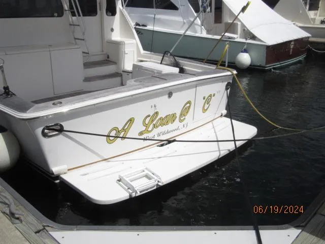 Slide: The Image of 2004 Ocean Yachts Super Sport docked, named A Loan @ C, West Wildwood, NJ. - 4
