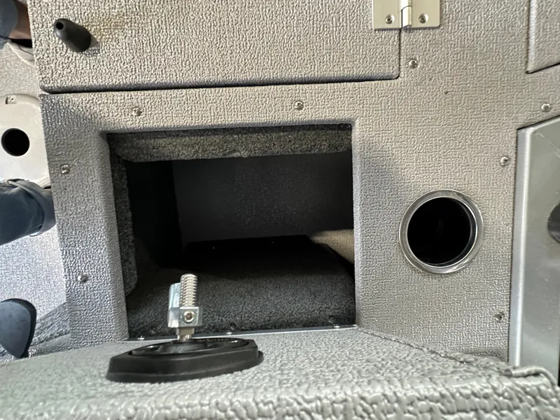 Slide: The Image of 2024 Smoker Craft Ultima 182 boat interior storage compartment. - 12