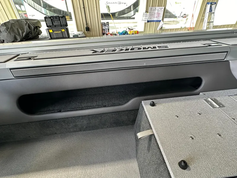 Slide: The Image of 2024 Smoker Craft Ultima 182 boat interior storage compartment. - 13