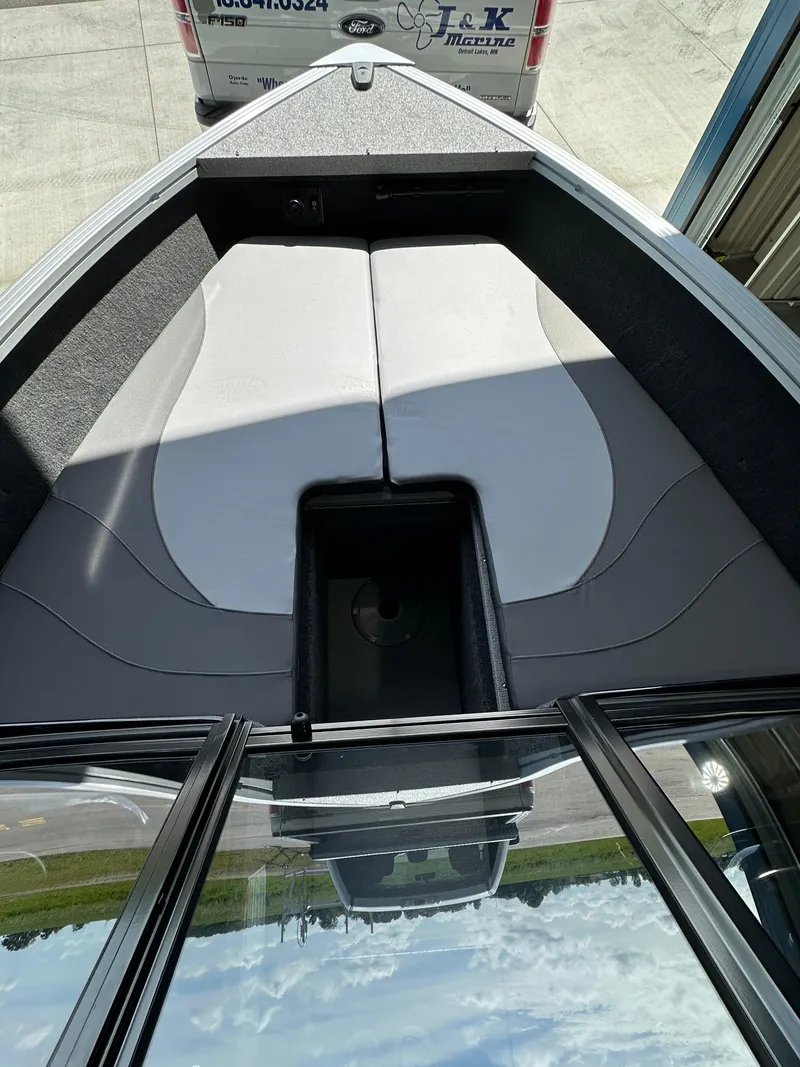 Slide: The Image of 2024 Smoker Craft Ultima 182 boat interior with cushioned seating. - 19