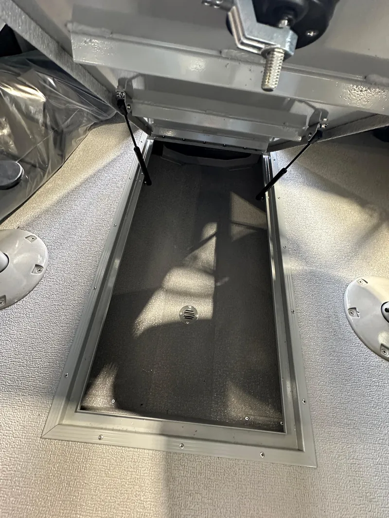 Slide: The Image of 2024 Smoker Craft Ultima 182 boat storage compartment. - 7