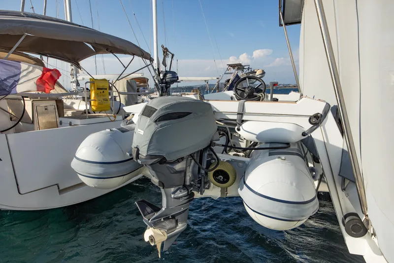 Slide: The Image of 2023 Fountaine Pajot Tanna 47 with inflatable dinghy and outboard motor. - 18