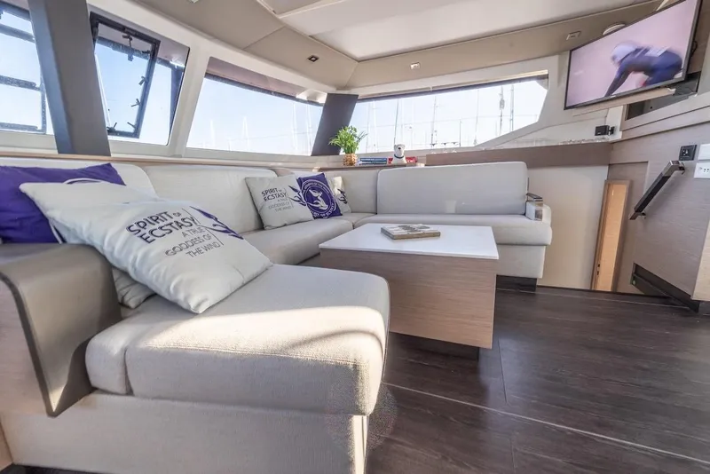 Slide: The Image of Luxurious interior of 2023 Fountaine Pajot Tanna 47 yacht with modern seating and decor. - 21