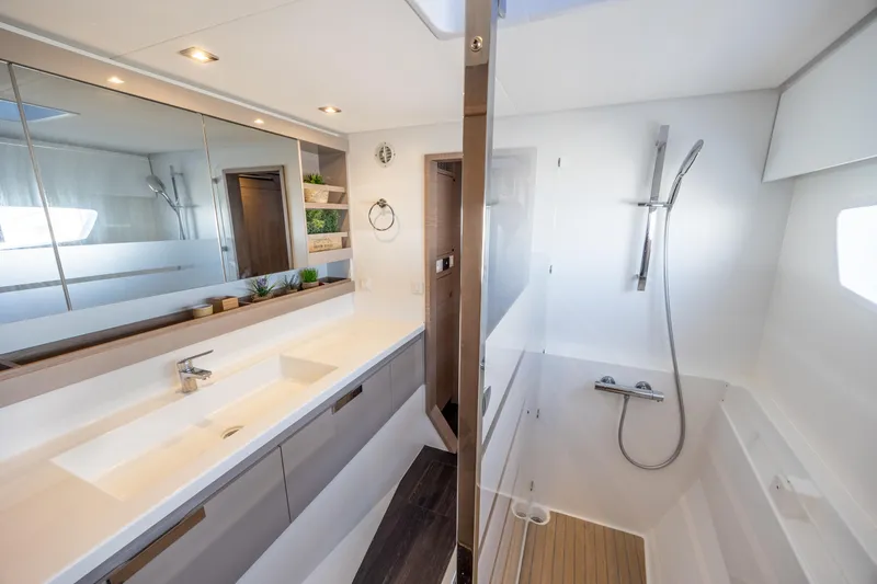 Slide: The Image of Luxurious bathroom in 2023 Fountaine Pajot Tanna 47 yacht with modern fixtures and sleek design. - 45