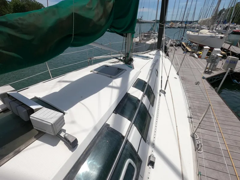 Slide: The Image of 1992 Beneteau First 35s5 sailboat docked at marina. - 4