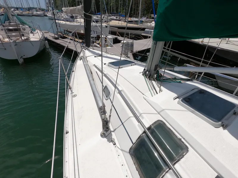 Slide: The Image of 1992 Beneteau First 35s5 sailboat docked in marina. - 5