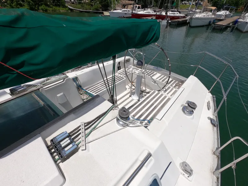 Slide: The Image of 1992 Beneteau First 35s5 sailboat docked in marina. - 6