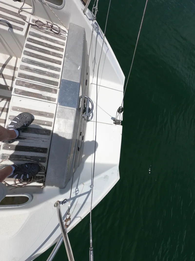 Slide: The Image of Deck of a 1992 Beneteau First 35s5 sailboat on the water. - 7