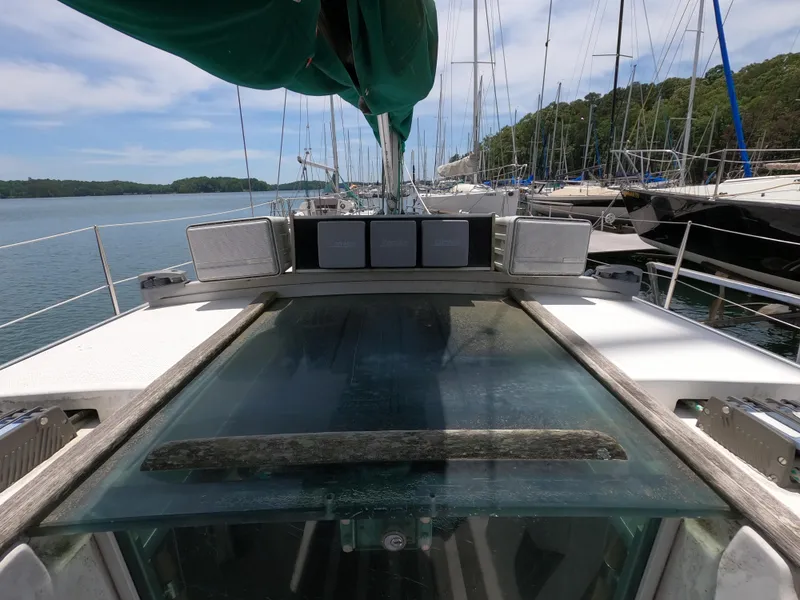 Slide: The Image of Beneteau First 35s5 sailboat cockpit view, 1992 model, docked in harbor. - 9